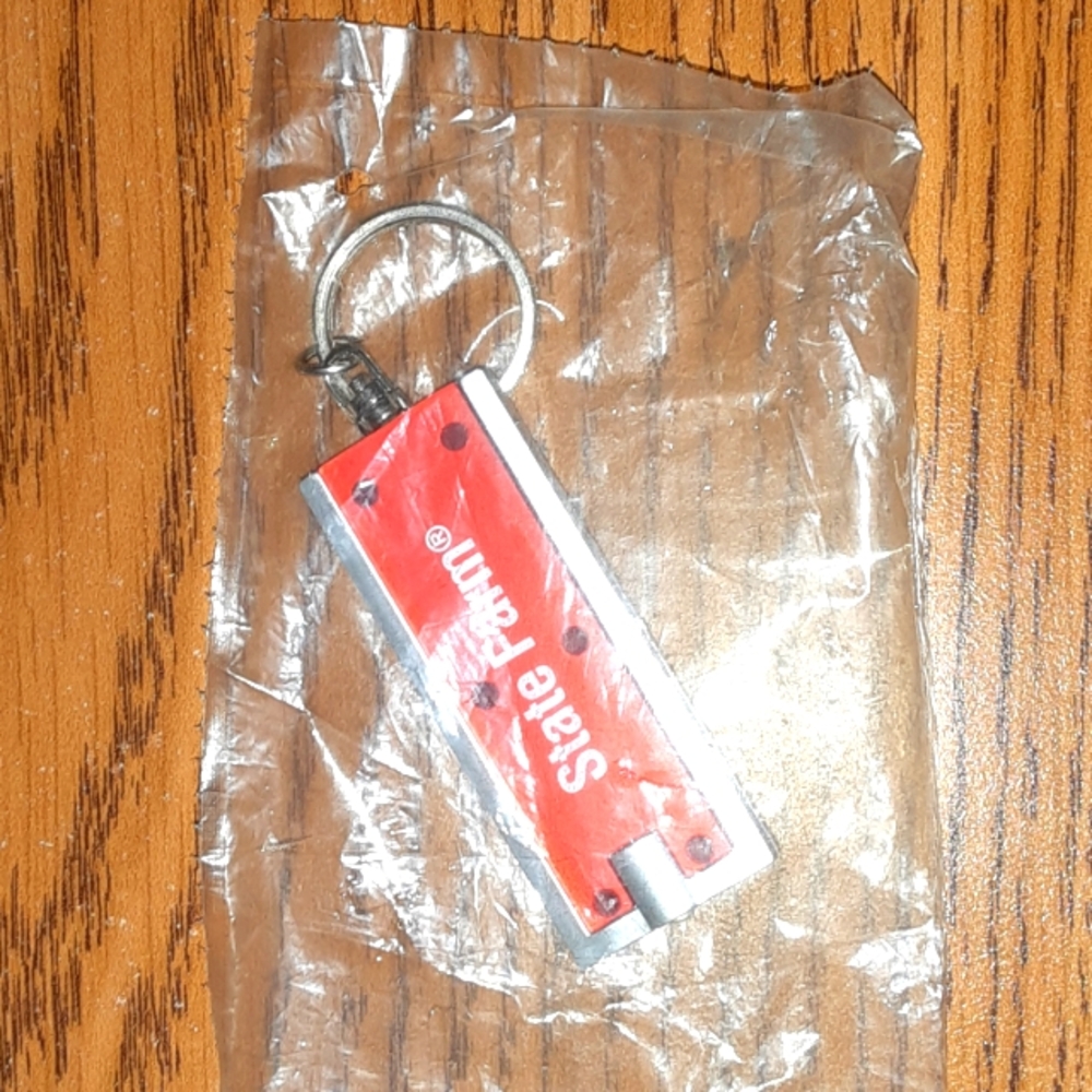 STATE FARM LIGHT KEYCHAIN CHARM NEW IN PACKAGE